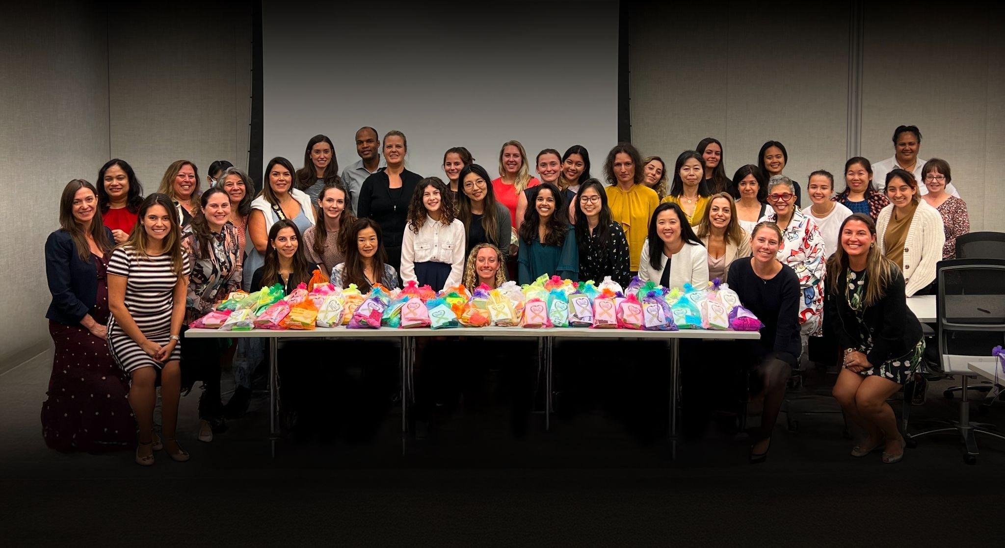A team of KCCF volunteers with Crazy Socks gift bags